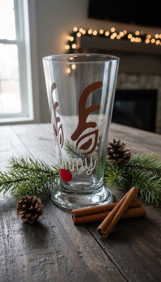 Clear glass with brown and red design on a patterned surface