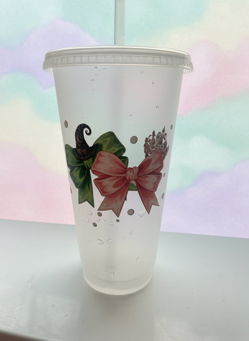 Clear plastic cup with floral design on a white surface