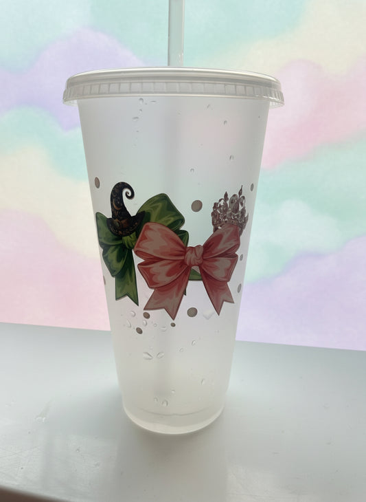 Clear plastic cup with floral design on a white surface