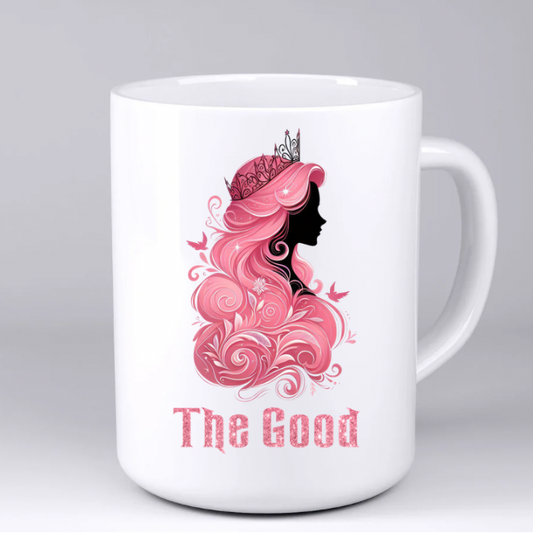 White mug with a pink silhouette design and 'The Good' text on a light gray background
